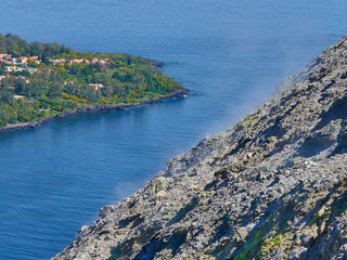 Sulphur gas coming out of the edge of the volcanic crater on the Vulcano island in the Aeolian...