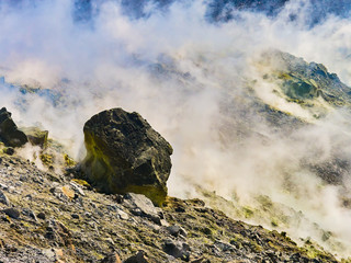 Sulphur gas coming out of the edge of the volcanic crater on the Vulcano island in the Aeolian...