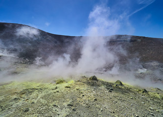 Sulphur gas coming out of the edge of the volcanic crater on the Vulcano island in the Aeolian islands, Sicily, Italy
