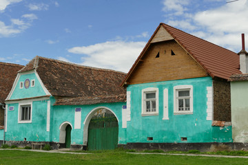 Fototapeta na wymiar a green painted house in Romania