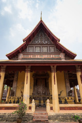 Naklejka premium View of the Buddhist Wat Si Saket (Sisaket) temple in Vientiane, Laos, on a sunny day.