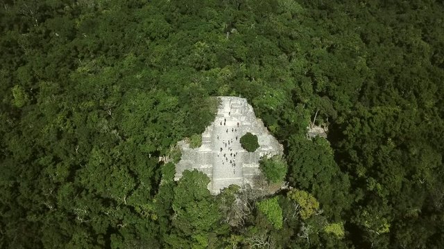 Aerial video flying towards the mayan Calakmul Temple in the Mexican Yucatan. The mayan ruins at Calakmul, Mexico