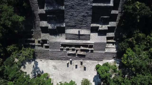 Aerial video flying towards the mayan Calakmul Temple in the Mexican Yucatan. The mayan ruins at Calakmul, Mexico