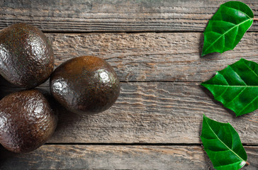 Avocado on a wooden background