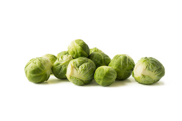 Fototapeta premium Brussels sprouts cabbage isolated on a white. Brussels sprouts cabbage on a white background. Cabbage with copy space for text.