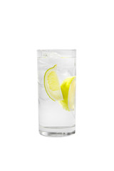 Transparent cocktail in a tall glass with ice cubes with two slices, lime quart, soda, aeration. Side view Isolated white background. Drink for the menu restaurant, bar, cafe