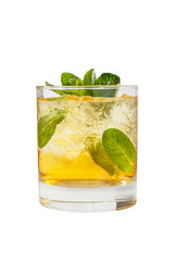 Transparent one-color cocktail in a low glass with crushed ice frappe with mint leaves with melon, pear, apple taste. Side view Isolated white background. Drink for the menu restaurant, bar, cafe