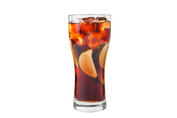 A single-colored transparent cocktail in a tall glass with ice cubes and slices, a quarter of lime with a taste of fruits, berries, colas, ice tea. Side view Isolated white background