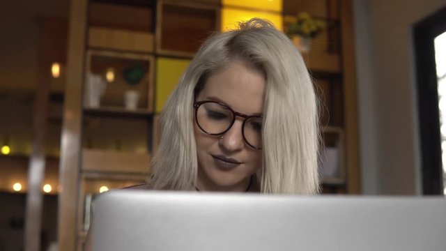 Online education. Female student studying on laptop