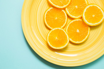 Orange on yellow plate