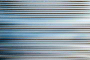 Fototapeta premium Gray metal shutter door background