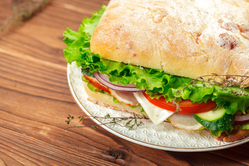 sandwich on a wooden table