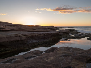 Sunset on rocky beach, Red Bluff, Kalbarri, Western Australia