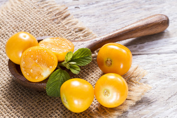 fruit of cape gooseberry, uvilla on wooden background