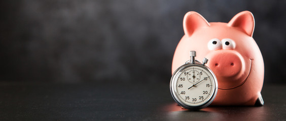 Analog stopwatch on black background