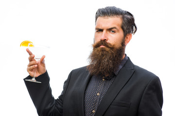 Hipster raising glass with margarita. Man holds glass, cocktail