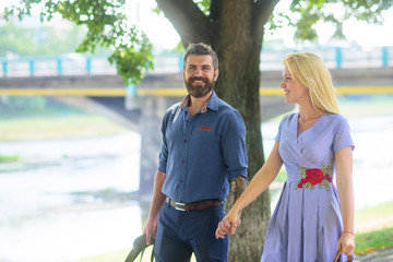 Naklejka premium Romantic walk concept. Happy couple in love rest together.