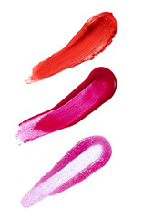 collection of various lipstick and nail polish strokes on white background. each one is shot separately