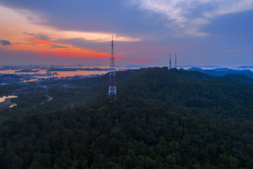 Obraz premium Batam coastal village town at sunset an aerial view, Indonesia