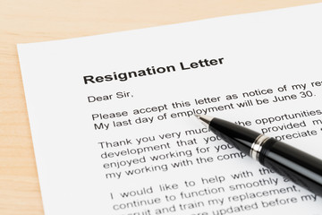 Resignation letter resign with pen