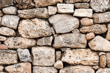 abstract background texture of stone blocks wall