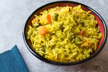Yellow Saffron Basmati Rice with Turmeric  and Vegetables Pilav or Pilaf in Bowl.