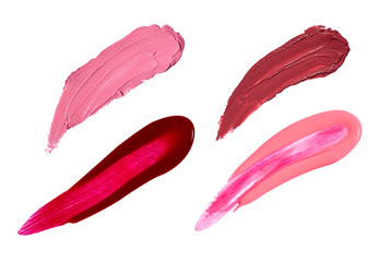 collection of various lipstick and nail polish strokes on white background. each one is shot separately
