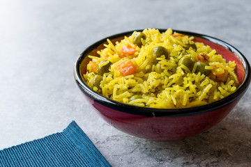 Yellow Saffron Basmati Rice with Turmeric  and Vegetables Pilav or Pilaf in Bowl.