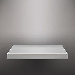 White empty shelf on a gray wall for design. Mockup