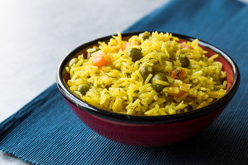 Yellow Saffron Basmati Rice with Turmeric  and Vegetables Pilav or Pilaf in Bowl.