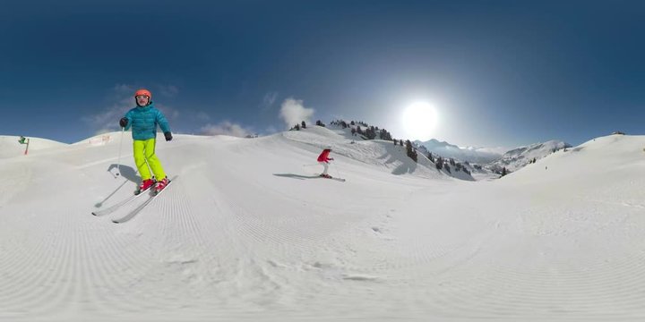 360 VR 4K video couple skiing together
