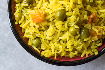 Yellow Saffron Basmati Rice with Turmeric  and Vegetables Pilav or Pilaf in Bowl.