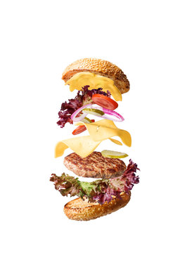 juicy and fresh classic burger with ingredients on white background