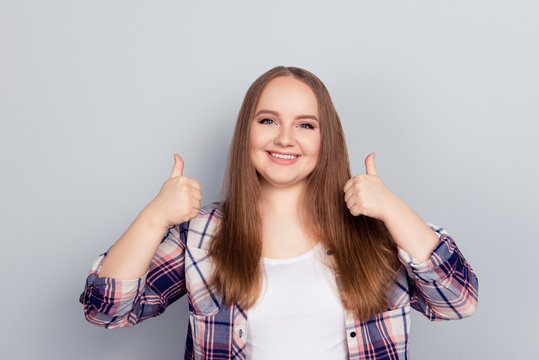 Young woman with two thumbs up