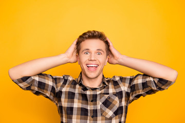 Wow my hairstyle is so good! Close up portrait of excited cheerful rejoicing handsome joking laughing attractive funky friendly glad manager touching fixing hair with balm isolated on background