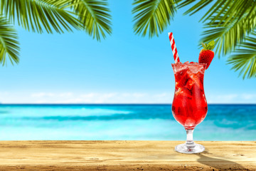 Summer drink on desk and sea landscape 