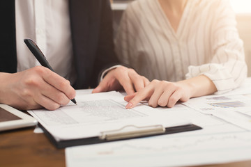 Business colleagues working with documents