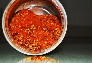 red cooking spices mixture on the table