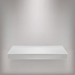 White empty shelf on a gray wall for design.