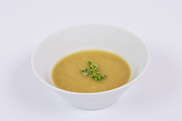 Chickpea soup with vegertables on a white