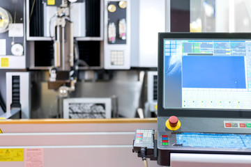 High precision CNC wire cut machine working, operator machining die metal mold process