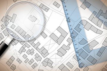 Plastic set square and magnifying glass over an imaginary cadastral map of territory with buildings, fields and roads - 3D render concept image with copy space