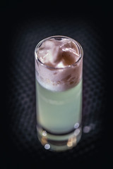 Alcoholic cocktails in shot glas