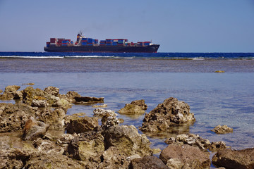 International Shipping by Container Cargo Ship at the evening to customer,Logistics, Freight Transportation and Shipping.