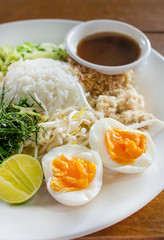  sweet and sour with rice, vegetable ,herbs and egg salad Thai southern style /Nasi Kerabu (Kao Yum)