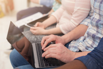 Fototapeta premium Group of unrecognizable people using gadgets