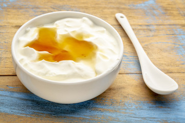 bowl of Greek yogurt with natural honey