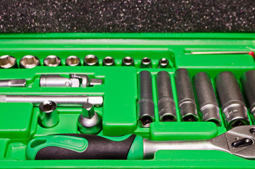 Tool set in a green box.