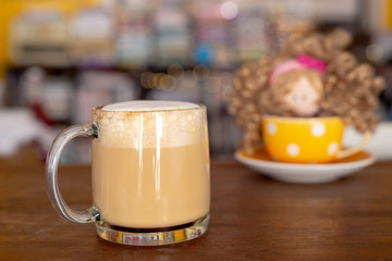 a cup of hot latte coffee