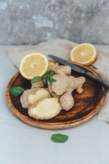 Fresh ginger on linen tablecloth